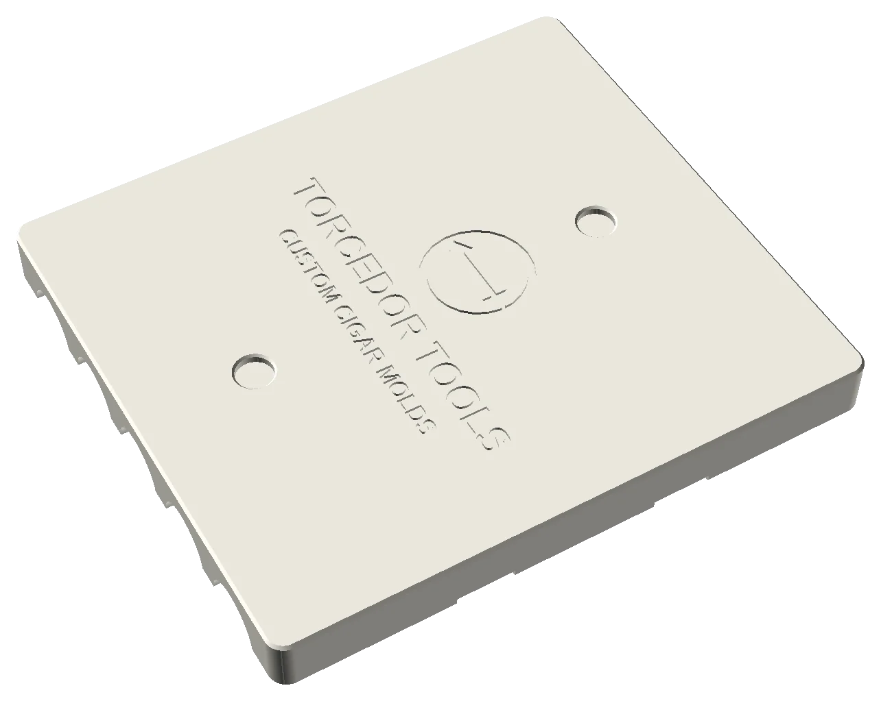 Back face of a mold engraved with the Torcedor Tools logo and brand text