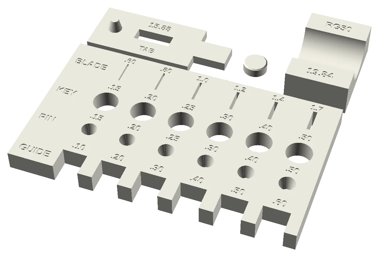 Calibration test print with labeled fit holes, slots and a mini cavity block